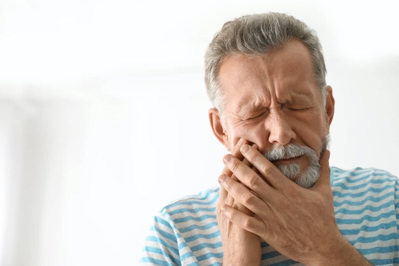 Man with toothache